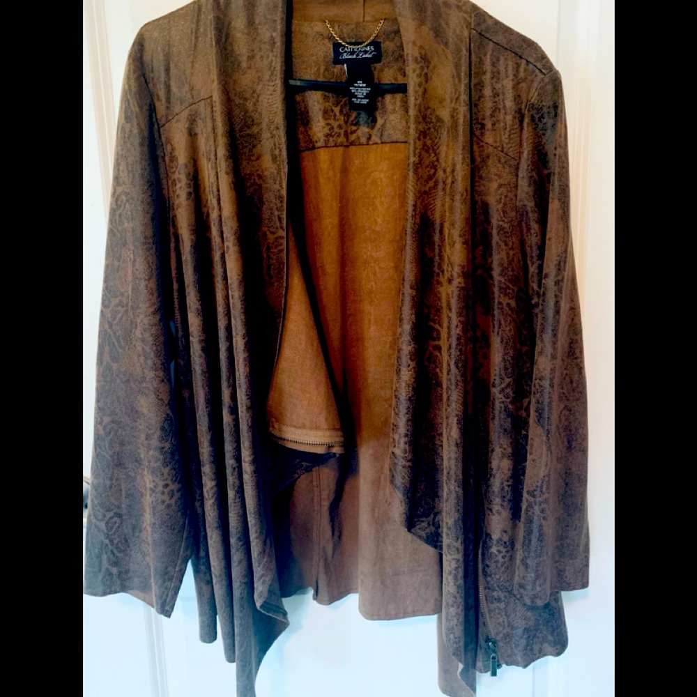 Faux Leather jacket with reptile print.